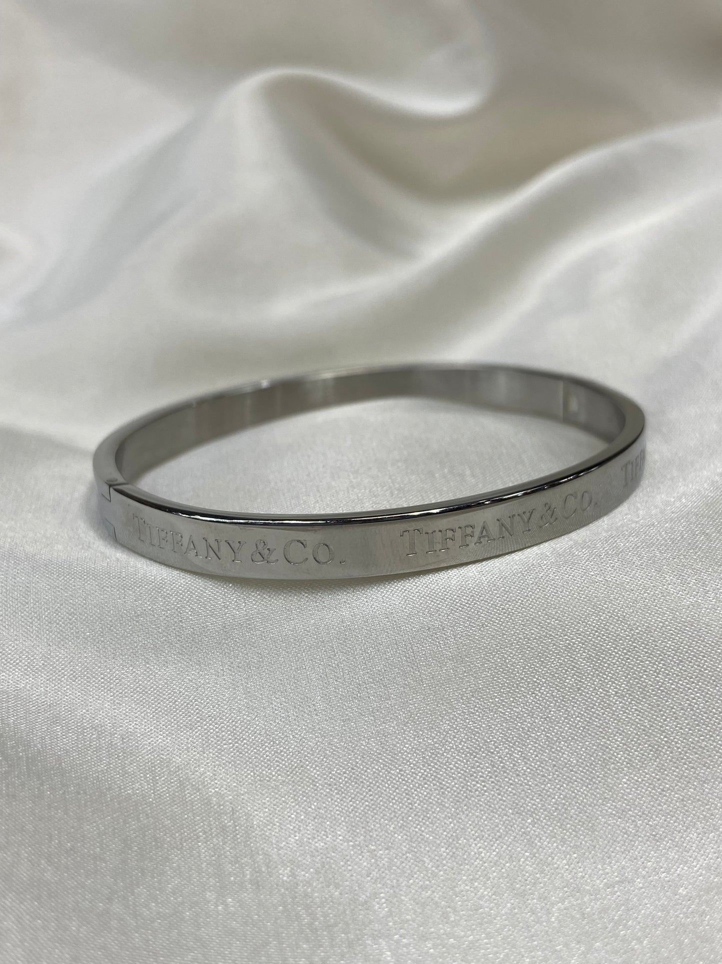 Tiff & Co Stainless Steel Silver Bangle