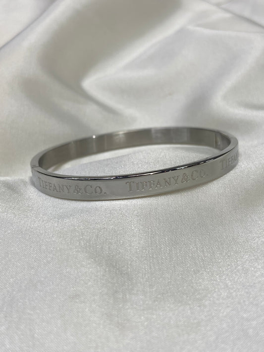 Tiff & Co Stainless Steel Silver Bangle